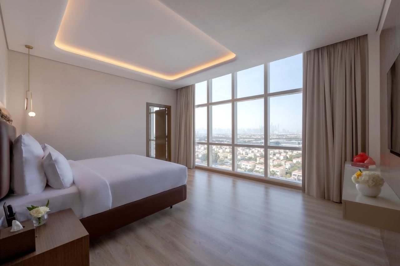 Movenpick Jumeirah Village Triangle Dubai Exteriör bild Suite bedroom