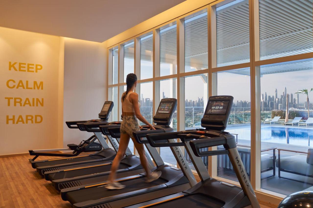 Movenpick Jumeirah Village Triangle Dubai Exteriör bild The gym at the hotel