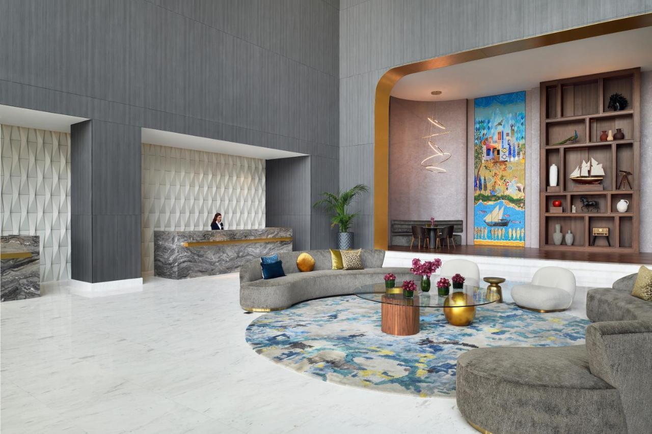 Movenpick Jumeirah Village Triangle Dubai Exteriör bild The lobby of the hotel