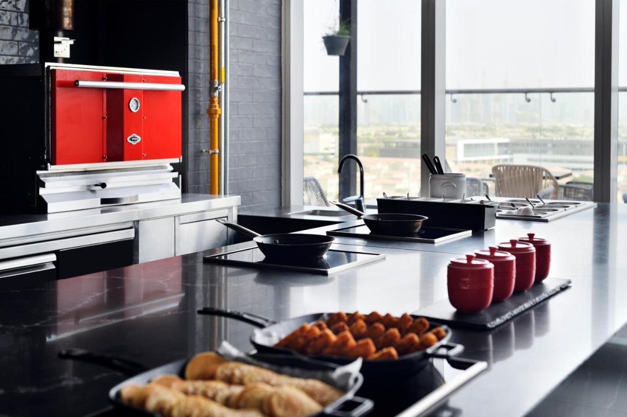 Movenpick Jumeirah Village Triangle Dubai Exteriör bild A commercial kitchen